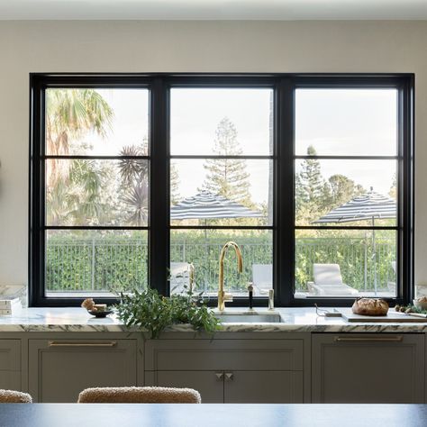 Black Frame Kitchen Windows, Kitchen Service Window, Kitchen Window Ledge, Kitchen Black Window Frame, Window Wall Kitchen, Black Inset Windows, Black Pella Windows, Kitchen With Lots Of Windows, Anderson Black Windows