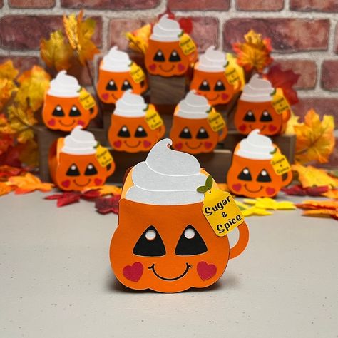 Add a touch of sweetness to your fall celebrations with our adorable Smiling Happy Pumpkin Mug Treat Boxes! These charming little boxes feature a cheerful pumpkin face with red heart-shaped cheeks, topped with a dollop of whipped cream and a playful tag that reads "Sugar and Spice." Each box also comes with a pre-strung tag that beautifully captures the essence of autumn, reading "Pumpkins, Falling Leaves, Bonfires, Cozy Sweaters, Hayrides, Apple Cider." Treats Table, Autumn Reading, Fall Party Favors, Table Decor Party, Small Treats, Pumpkin Mug, Happy Pumpkin, Pumpkin Face, Pumpkin Season