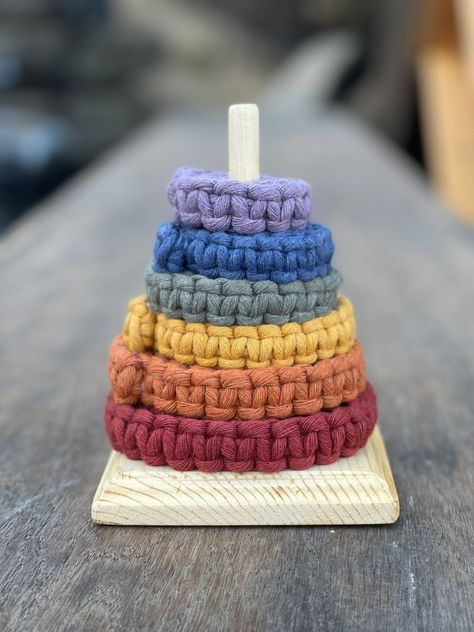 Montessori Macrame Stacking Toy: A Sensory and Fine Motor Skill Building Toy for Toddlers Homemade Montessori Toys, Bedrest Activities, Macrame Baby Toys, Montessori Aesthetic, Macrame Toys, Montessori Crochet, Diy Baby Toys, Homemade Baby Toys, Homemade Baby Gifts