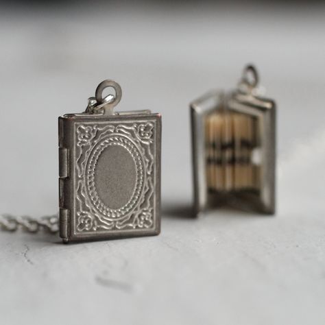 This exquisitely detailed little personalized locket necklace is a miniature book made from silver plated brass. Inside is a secret hidden message, specially folded and fitted inside the locket to look just like the pages of a real book! The locket has a perfectly working hinge and clasp and, if you wish, there is space inside for you to add two tiny photos. The locket is a lovely and delicate size, measuring just 16mm x 10mm (about the size of your fingertip!). The necklace chain is available i Book Locket Necklace, Victorian Locket, Victorian Books, Silk Purse, Personalized Book, Book Locket, Miniature Book, Sister Necklace, Engraved Initials