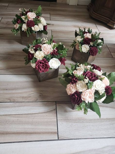 "Sola wood flower centerpieces arrangement sitting on a 6\"×6\"×6\" wooden box. Flowers are all sola wood flowers in off white, burgundy and blush. Greenery is a mixture of artificial and preserved. Made to order please allow 4-6 weeks for shipping" Burgundy And Dusty Rose Centerpieces, Elegant Rustic Wedding Table Decor, Wine And Blush Wedding Table Settings, Burgundy And Blush Wedding Reception, Wedding Centerpieces Maroon, Burgundy Blush Centerpiece, Burgundy Rustic Wedding Centerpieces, Pink And Burgundy Centerpieces, Maroon Flower Arrangements