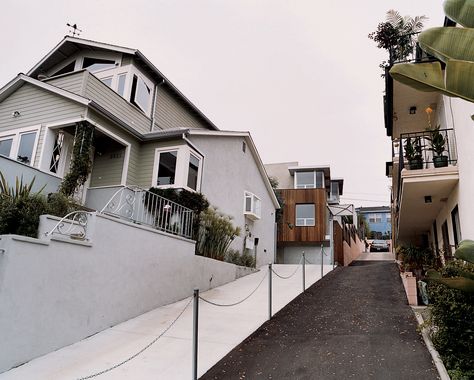 The restored original and new addition. After a brief tussle over access to their shared driveway (resulting in what Bornstein calls a “spite fence”), most of the occupants in the apartment building next door appreciate having a family as neighbors, rather than another big box to block their light and views. Driveway Divider Ideas, Shared Driveway Divider Ideas, Shared Driveway Divider, Driveway Divider, Budget Renovations, Driveway Inspiration, Shared Driveway, Having A Family, Driveway Ideas