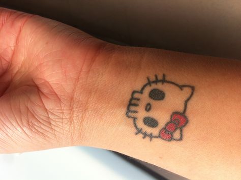 Cute But Edgy Tattoos, Small Tattoos Hello Kitty, Small Cute Skull Tattoos, Hello Kitty Simple Tattoo, Emo Skull Tattoo, Tiny Emo Tattoos, Hello Kitty Skull Tattoo, Y2k Tattoo Ideas Hello Kitty, Hello Kitty Couple Tattoo