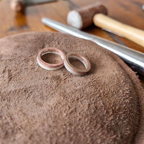 MAKE YOUR OWN: 9ct rose gold and sterling silver, textured wedding rings. Handmade this weekend for each other by the couple themselves. Silver adds a brighter white and more affordable option to 9ct white gold which has a yellowy tone. These rings will be hallmarked silver and 9ct gold as a mixed metal piece of jewellery. This was my last MYO rings workshop until September due to school holidays. If you are getting married in autumn 2024 and want to make rings please get in touch so I h... Textured Wedding Ring, Silver Couple Rings, Make Rings, Hand Rings, Rings Handmade, Autumn 2024, Bespoke Jewellery, School Holidays, Couple Rings