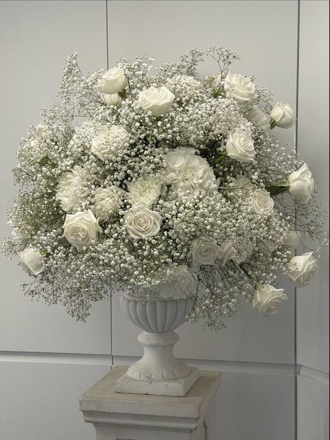 Gypsophila urn with roses Gypsophila And Roses Wedding, Roses And Gypsophila Centrepiece, White Rose And Gypsophila Centre Pieces, Gypsophila And Roses Wedding Decoration, White Flowers Decoration Wedding, Gypsophila Wedding Aisle, White Wedding Florals Ceremony, Gypsophila And White Rose Bouquet, Floral Wall For Wedding