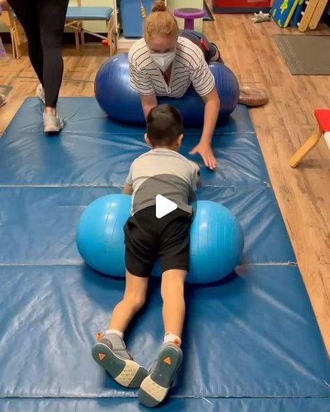 Starfish Therapies on Instagram: "Fun new activity that works on core strength as well as weight bearing through arms. We have been focusing on the weight bearing for kids who have altered tone in their arms as well as kids who have general weakness. The goal was to try to get the ball to the other person’s peanut to score a point. I can tell you I was definitely out of breath when we finished! The further out on the peanut they are the harder it is. Having them switch hands will also work on bilateral coordination and timing/reactions. What fun games do you have? #starfishtherapies #motorsmartkids #makingadifference #core #cerebralpalsy #weakness #hightone #spasticity #play #grossmotorplay #bilateralcoordination #kids #hypotonia #peanut #soccer #weightbearingexercise #pediPT #pediOT #p Bilateral Coordination Activities Kids, Pediatric Physical Therapy Activities, School Based Therapy, Coordination Exercises, Pediatric Pt, Coordination Activities, Peanut Ball, Bilateral Coordination, Out Of Breath