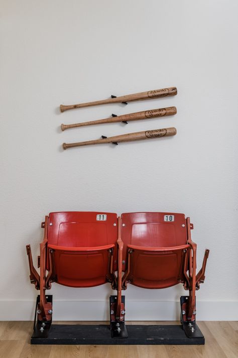 HGTV Fixer to Fabulous Home Renovation with custom bats and stadium seats. Baseball Bat Decor, Baseball Basement, Sports Memorabilia Room, Custom Banquette Seating, Baseball Room Decor, Fixer To Fabulous, Jenny Marrs, 90s House, Trim Paint Color