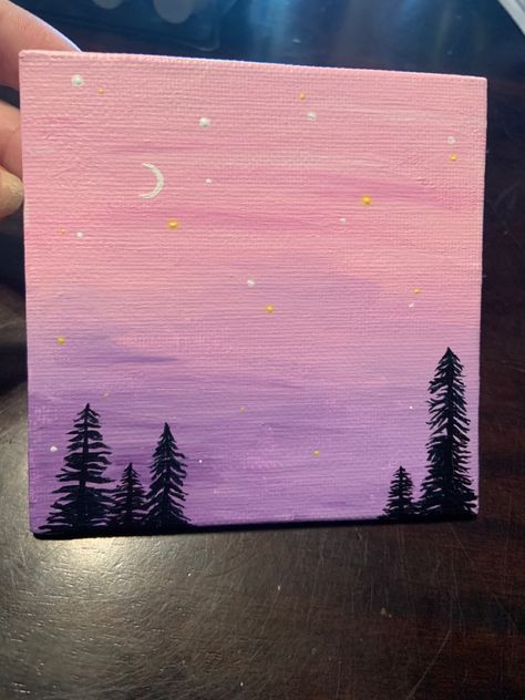 Pink and purple ombré background with black tree outline. Small crescent moon with some dotted stars throughout. Painting Ideas With Pink Background, Painting Ideas On Canvas Backgrounds, Pink And Purple Canvas Painting, Pink Sunset Canvas Painting, Ombre Canvas Painting Ideas, Pink Background Canvas Painting, Pink Sky Canvas Painting, Easy Pink Sunset Painting, Cute Sky Paintings