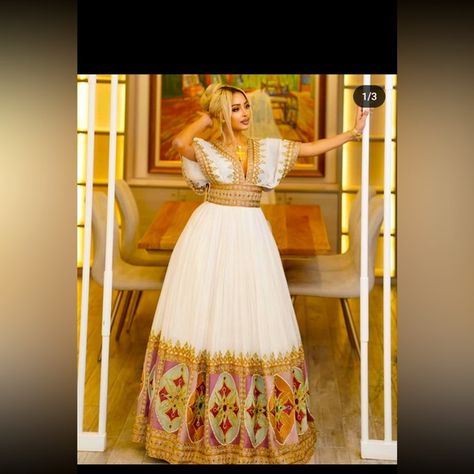 Ethiopian and Eritrean traditional dress Eritrean Dress, Ethiopian Clothing, Ethiopian Traditional Dress, Ethiopian Dress, Habesha Kemis, Traditional Dress, Brown Orange, African Clothing, Traditional Dresses