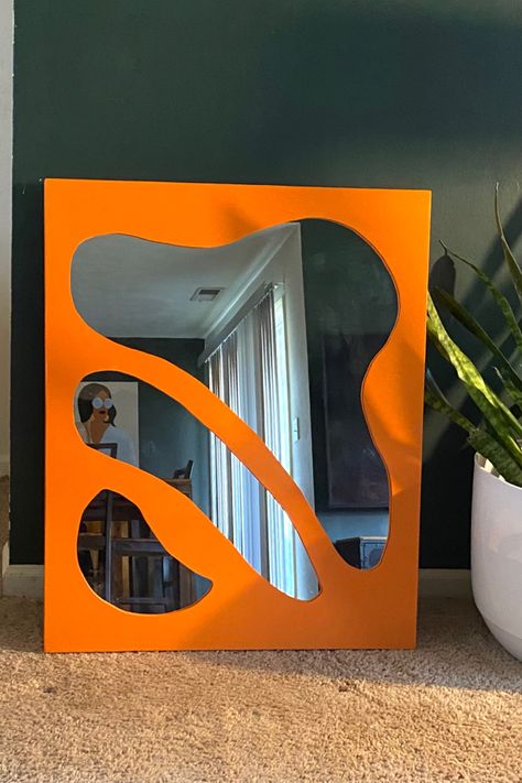 Irregular mirror. Blob mirrors. Orange decor. Funky mirrors Pastel Room Aesthetic, Colorful Eclectic Home, Funky Mirrors, Mirror Wall Living Room, Orange Home Decor, Cozy Fall Decor, Mirror Shapes, Unique Mirrors, Cool Mirrors