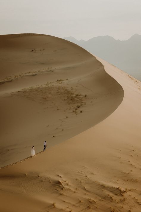 couple hikes along sand dunes at sunrise in the Mojave desert Mojave Moon, Cambria California, Mojave National Preserve, Joshua Tree Engagement, Southwest Colorado, Yosemite California, Joshua Tree California, Desert Elopement, Big Sur California