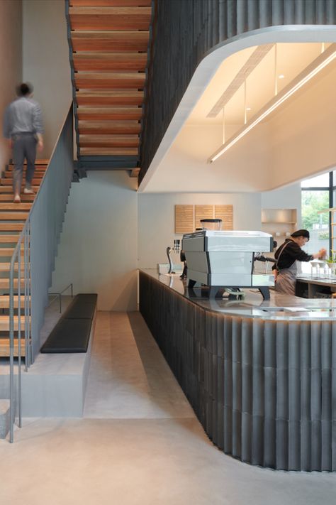 The new Blue Bottle Coffee shop is located in downtown Shanghai. Chinese Roof, Stairwell Wall, Dark Brown Furniture, Blue Tile Wall, Types Of Bricks, Blue Bottle Coffee, Wall Tiles Design, Coffee Store, Coffee Shops Interior