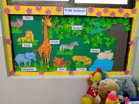 Wild Animals Board Decoration, Animals Bulletin Board Preschool, Animal Bulletin Board Ideas Preschool, Animal Theme Board For Preschool, Animal Theme Bulletin Board Ideas, Animals Bulletin Board, Color Red Activities, Animals Chart, Wild Animal Nursery