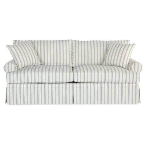 Upholstered in neutral-hued Sunbrella-a high-performance fabric that repels stains, spills, mold, and bacteria-this skirted sofa is guaranteed to remain crisp and clean for years to come. And because it's bolstered to a kiln-dried hardwood frame and amply padded with high-density foam enveloped in a blanket of fiber and fabric tick, it boasts equal parts style and comfort. Two matching throw pillows included. Handcrafted in the USA. Blue Striped Couch, Dorm Couch, Coastal Sofa, Striped Couch, Skirted Sofa, Striped Sofa, White Couches, Blue Armchair, Fabric Armchairs