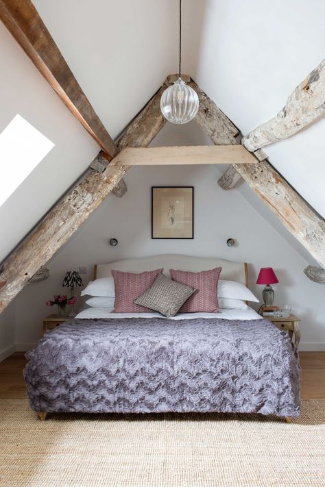 Bedroom ideas: be inspired by this farmhouse remodel. The exposed beams in this loft conversion create a beautiful framework for the room and are complemented by soft coloured walls and furnishing to create a relaxing bedroom space. #bedroom #beamsceiling Deco Bilik Tidur Kecil Simple, Loft Conversion Design, Loft Conversion Bedroom, Tiny Loft, Cottage Lighting, Farmhouse Renovation, 2 Bedroom House Plans, Small Loft, Real Homes