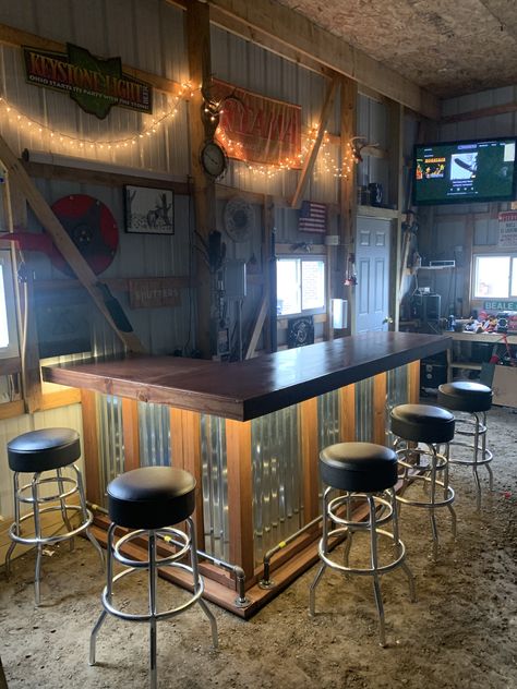 Built from scratch bar for pole barn. Man Cave Home Bar Garage, Shop With Bar Area, Pole Barn Wall Ideas, Pole Barn Bar Ideas, Pole Barn Man Cave Ideas, Pole Barn Bar, Garage Bar Ideas Man Caves, Man Cave Pole Barn, Frank Betz House Plans