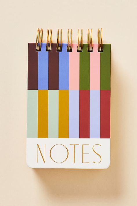 Vibrant with stylish patterns, this notepad has ample space for all your to-dos. | Striped Notepad by Anthropologie Trendy Stationery, Modern Calligraphy Practice, Monthly Desk Calendar, Vow Booklet, Planner Vintage, Note Pad Design, Spiral Planners, Vintage Tile, Planner Cover