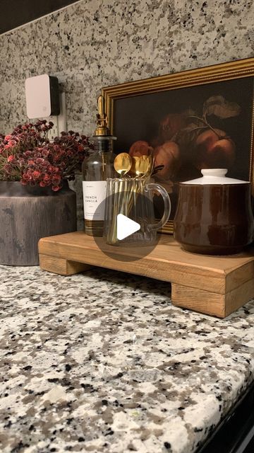 Madelaine on Instagram: "Thank you so much @luxebco for sending this beautiful wooden riser! 🤎 it’s so versatile and can easily be styled anywhere in your home. I decided to make a little coffee corner on my kitchen counter because 2 coffee bars are better than 1! 🙌🏻  Comment SHOP or go to my link in bio to shop my VIBE✨  Follow for more home inspo! 🫶🏼  #luxebco #woodenriser #kitchencounterdecor #kitchenideas #kitcheninspo #stylewithme #stylingtips #coffeecorner #coffeebar #coffeestation #moodyinteriors #cozyhome" Coffee Corner Countertop, Coffee Station On Counter, Wooden Riser, Coffee Bar Design, Moody Interiors, Coffee Bars, Kitchen Counter Decor, Coffee Corner, Home Inspo