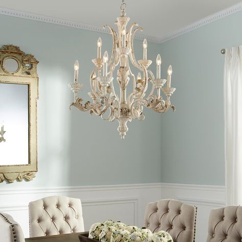 More than just illumination for your entryway or dining room, this eye-catching chandelier adds heirloom-inspired appeal to your abode. Crafted from metal, its frame features a turned silhouette accented by scrolling arms and carved details. Its nine lights are what really make this piece shine, sitting among two tiers and offering an exposed candelabra design for a warm glow. This fixture measures 34'' H x 28'' W x 28'' D. Chandelier Dining Room, Quorum Lighting, Tiered Chandelier, Tier Chandelier, Chandelier Metal, Dining Room Light Fixtures, White Chandelier, Candle Style Chandelier, Geometric Chandelier