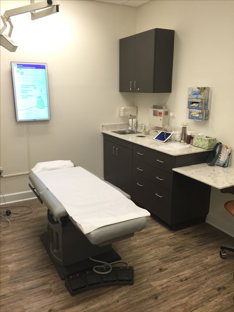 Each examination room features a wall mounted screen providing up to date medical information and healthy living tips. Exam Room Decor Medical, Dv Lottery, Examination Room, Recovery Room, Medical Examination, Room Desk, Medical Information, Make A Change, Living Tips