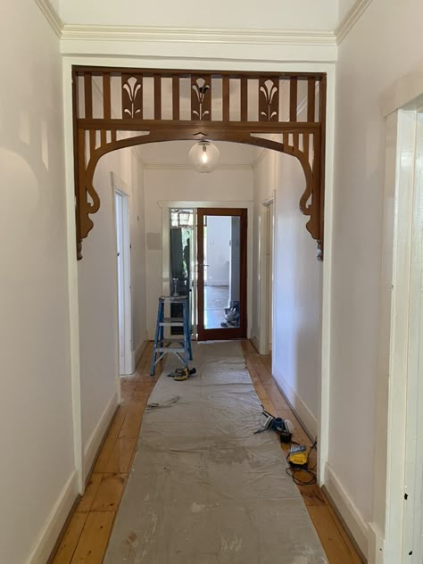 Frame A Doorway, Arched Doorway Interior, Rounded Archways In Homes, Hallway With Beams, Corbels Hallway, Scalloped Archway, Arched Hallway, Doorway Arch, Archways In Homes