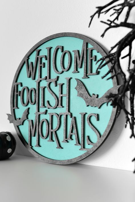 Halloween Sign Cricut, Welcome Foolish Mortals Sign Diy, Circular Signs Decor, Halloween Signs Cricut, Halloween Cnc Project, Cnc Halloween Projects, Haunted Mansion Halloween Decorations, Welcome Halloween Sign, Spooky Cricut Ideas