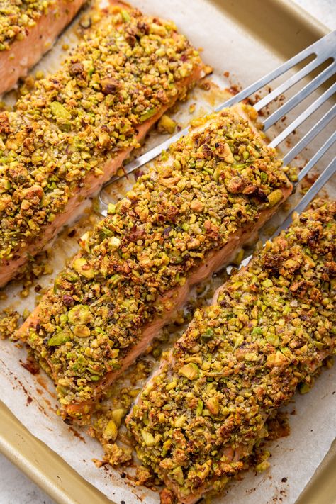 A nutty herb-infused crust and honey Dijon glaze take everyday salmon fillets to the next level in this easy pistachio crusted salmon recipe! Salmon Half Baked Harvest, Grapefruit Salmon, Salmon Sticks, Vegan Mashed Cauliflower, Crusted Salmon Recipes, Salmon Fillet Recipes, Dijon Salmon, Herb Crusted Salmon, Pistachio Crusted Salmon