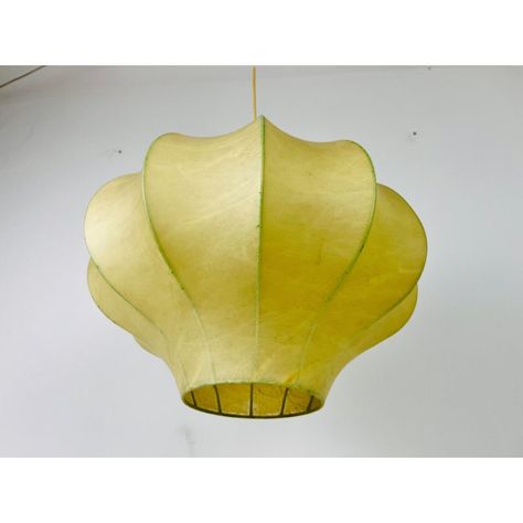 A cocoon pendant lamp made in Italy in the 1960s. The hanging lamp has been manufactured in the design of the lamps made by Achille Castiglioni. The lamp shade is of original cocoon and has an flower shape.   Measures:  Height: 36-72 cm Diameter: 42 cm  The light requires one E27 light bulb. Works with both 120/220V. Very good vintage condition.  Free worldwide express shipping.Continue Reading Hallway Pendant Lighting, 1960s Italy, How To Make A Chandelier, Retro Chandelier, Large Hallway, Achille Castiglioni, Fabric Pendant, Under The Tuscan Sun, Mid Century Modern Lighting