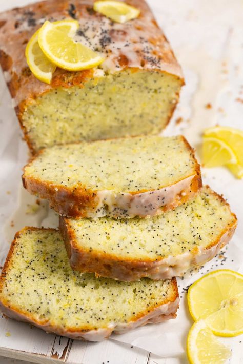 My Lemon Poppyseed Cake has a moist, tender crumb, is studded with plenty of poppyseeds and full of natural lemony citrus flavors. The cake is infused with a lemon simple syrup to keep it ultra-moist and is finished with a simple lemon icing. #lemoncake #lemonpoppyseed #lemonpoppyseedcake #lemonpoppyseedbread #lemonloaf #springdesserts #summerdesserts #lemondesserts #krollskorner Lemons Cake, Lemon Poppyseed Cake Recipe, Lemon Simple Syrup, Poppy Seed Cake Recipe, Breakfast Desserts, Poppyseed Cake, Syrup Cake, Lemon Poppyseed Bread, Lemon Poppyseed Cake