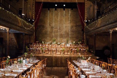 Long Tables Fairy Lights Decor Rustic Wooden Trestle Flowers Bottles Origami Cranes Wilton's Music Hall Wedding The Shannons Photography #LongTables #FairyLights #Decor #RusticWedding #Wooden #TrestleTable  #WeddingFlowers #Bottles #OrigamiCranes #Wedding #WeddingIdeas  #WeddingDecor Music Hall Wedding, Fairy Lights Decor, Long Tables, Wedding Venues Indoor, Lights Decor, London Wedding Venues, Origami Cranes, Flower Bottle, St Paul's Cathedral