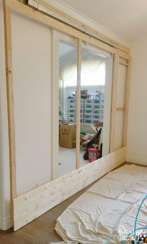 How to build a sliding wall to create a secret room. Yes, the wall slides open. Details on Design Dazzle Diy Sliding Wall, Diy Temporary Wall, Secret Room Doors, Bedroom Remodel Ideas, Sliding Walls, Fake Walls, Guest Bedroom Remodel, Kids Bedroom Remodel, Small Bedroom Remodel