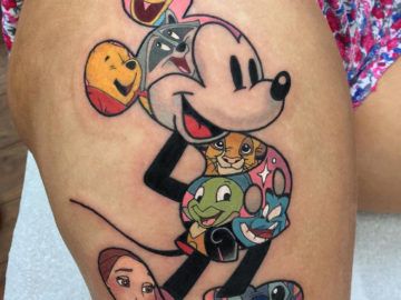 Disney characters thigh tattoo Disney Characters Tattoos, Tattoos Cartoon, Mickey Tattoo, Mouse Tattoo, Mickey Mouse Tattoo, Disney Sleeve Tattoos, Tattoo Wallpaper, Disney Sleeve, Lady Bug Tattoo