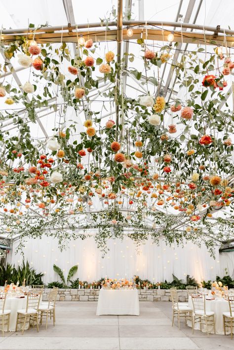 Strung Flowers Wedding, Ceiling Of Flowers Wedding, Tent With Greenery Ceiling, Floral Ceiling Wedding Reception, Chandelier With Flowers Wedding, Aerial Flowers Wedding, Wildflower Wedding Ceiling, Flower Tent Decoration, Flower Ceiling Installation Wedding