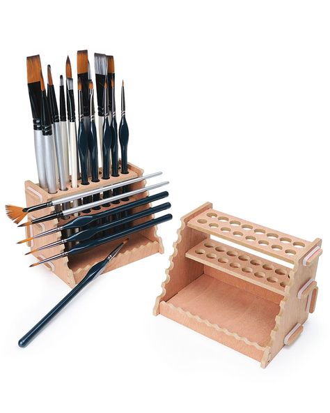 PRICES MAY VARY. 【Multifunctional Brush Station】Package includes 2 Packs of wood brush holder that fit a variety of size brushes in different directions. Paintbrush organizer helps you to stand brushes vertically for long storage, lay them down horizontally for drying, and rest at the bottom groove to stop brushes from rolling away while painting. 【Enough Holes to Store】The 2 paint brush holders and organizers have total 32 vertical holes(Qty 16 0.43” & Qty 16 0.39”), 12 horizontal paint brush d Pen Stand Painting Ideas, Paintbrush Organizer, Paint Brush Holder, Paint Organization, Brush Rest, Paint Brush Holders, Brush Holders, Desk Stand, Cerámica Ideas