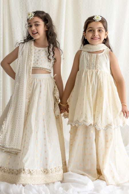 Buy Ivory Cotton Lining Mulmul Embroidered Thread Work And Sequin Lehenga Set For Girls by Chotibuti Online at Aza Fashions. Sequin Lehenga, Hand Embroidered Dress, Embroidery Neckline, Ethnic Wear Indian, Kids Ethnic Wear, Diwali Outfits, Wedding Dresses For Kids, Lehenga Designs Simple