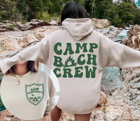 Camp Bachelorette Sweatshirts, Custom Camping Bachelorette Party Sweaters, Trendy Oversized Mountain Bachelorette Shirts, Girls Hiking Travel Adventure Tees, Bride Tribe Adventure Tshirts, Lake Themed Outfits ✧ SIZING ✧ ⋒ Please check our size chart before placing an order. ⋒ If you want an oversized look, pick a sweatshirt that is 2 sizes larger than your usual size. ✧ IMPORTANT NOTE: We try to depict all shirt and design colors as close to the original as possible but depending on your screen Bachelorette Hiking Outfit, Bachelorette Trip Themes, Hiking Bachelorette Party, Lake Tahoe Bachelorette Party, Bridesmaid Mugs, Camp Merch, Mountain Bachelorette Party, Lake Bachelorette Party, Bachelorette Party Lake