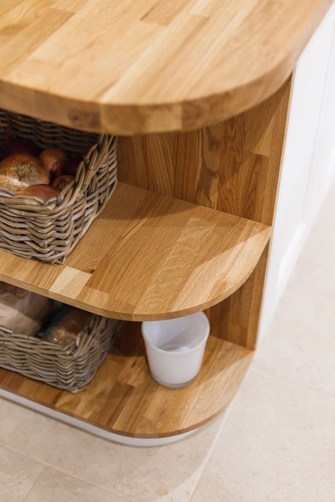 In this oak kitchen our specialist curved end cabinet was complemented by matching curved plinths painted in Farrow & Ball's All White, and a smooth radius corner on the oak worktop above.  The cabinet provides a good space for displaying ornaments and keeping items within easy reach. http://www.solidwoodkitchencabinets.co.uk/gbu0-display/specialist_cabinets.html Curved Worktop, Curved Kitchen Cabinets, Kitchen Corner Cabinet Ideas, White Classic Kitchen, Gel Stain Kitchen Cabinets, Open Kitchen Cabinet, End Cabinet, Open Kitchen Cabinets, Oak Worktop