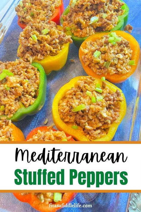 A twist on traditional Italian stuffed peppers. Made with ground turkey, brown rice, and Mediterranean flavors. They are tasty and filling. fitasafiddlelife.com Medditeranean Stuffed Peppers, Stuffed Peppers With Brown Rice, Mediterranean Diet Recipes With Ground Turkey, Ground Turkey Recipes Mediterranean, Mediterranean Diet Stuffed Peppers, Mediterranean Diet Ground Turkey Recipes, Stuffed Green Peppers With Ground Turkey, Mediterranean Ground Turkey Recipes, Stuffed Peppers With Ground Turkey