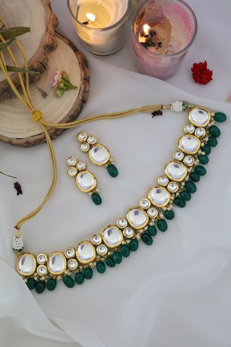 Gold plated choker encrusted with kundan embellishment and bead drops. Comes with earrings. - Aza Fashions Traditional Emerald Necklace, Green Kundan Jewellery Bridal, Green Dress Jewelry, Kundan Set Design, Emerald Necklace Indian, Green Jewellery Set, Green Choker Set, Green Kundan Necklace, Green Necklace Set