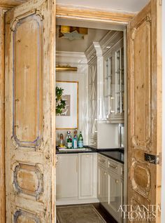 This appears ot be a bar area, but I'm putting it under pantries because I'd never have a bar. House Tour: Lovely Lakeside - Design Chic Design Chic Design Chic Ashley Gilbreath Interiors, Ashley Gilbreath, Pantry Layout, House Pantry, Chateaux Interiors, Home Wet Bar, Closet Bar, Columbus Georgia, Barn Kitchen