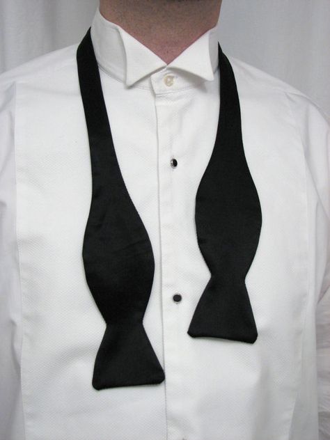 Classic bow tie - undone Tie A Bow Tie, Untied Bow Tie, Wing Collar Shirt, Black Tie Tuxedo, Black Tie Dress Code, Stylish Men Wear, Black Suit Wedding, Black And White Tuxedo, Suit Pin