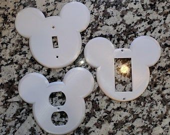 Outlet cover | Etsy Disney Light Fixtures, Disney Themed Guest Room, Disney Guest Bedroom, Hidden Disney Home Decor, Disney Inspired Rooms, Disney Room Ideas For Adults, Disney Basement, Disney Playroom, Disney Outlet