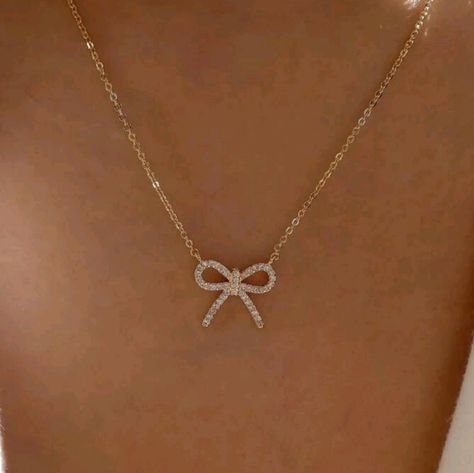 Gold-Tone Rhinestone Bow Necklace Secured With Lobster Clasp Beautiful But Simple Necklace, Cute Jewelry For Teens Necklaces Gold, Hoco Necklaces Gold, 18th Birthday Jewelry Ideas, Tiny Necklace Gold, Pearl Necklace With Bow, Bow Jewelry Aesthetic, Bow Pendant Necklace, Diamond Bow Necklace