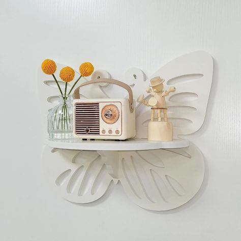 Affiliate.Cute Wall Display Rack for Kid’s Room, Small Decorative Shelf Wall Mounted, White Hanging Wall Shelf for Toys, Plants and Decorations Storage, White #nursery #walldecor #butterfly #girlroom #cute #decor Butterfly Nursery Decor, Wall Mounted Storage Shelves, Butterfly Nursery, Toy Shelves, Plastic Board, Carton Packaging, Mounted Shelves, Shelf Wall, Estantes Flotantes