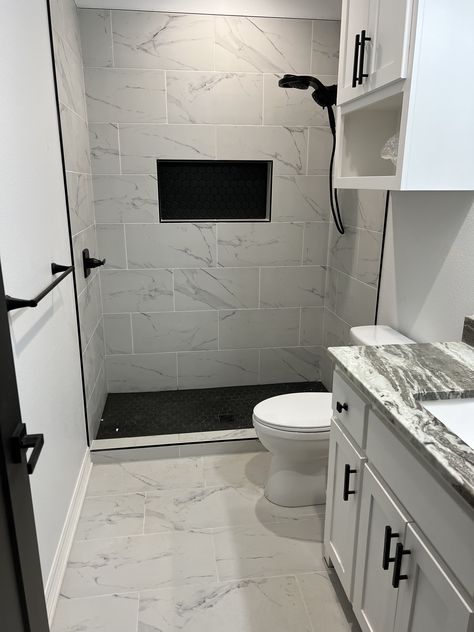 Shower Remodel Black And White, Bathroom Remodel White And Black, Trending Bathroom Tile Ideas, Small Bath Remodel Ideas, Large Tile Small Bathroom, Heated Bathroom Floors, Small Full Bathroom Ideas Color, Small Bathroom Stand Up Shower Ideas, Bathroom Before And After