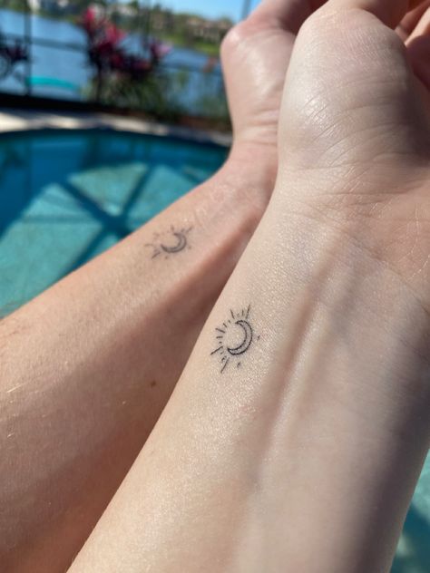 Tattoos by Johnny Black Small Sun And Moon Tattoo Behind Ear, Sun Moon Star Fine Line Tattoo, Sun And Moon Small Tattoo, Sun And Moon Sister Tattoos, Half Sun Half Moon Tattoo, Simple Sun And Moon Tattoo, Sonne Mond Tattoo, Tattoo For Husband, Family Tattoo Ideas Matching