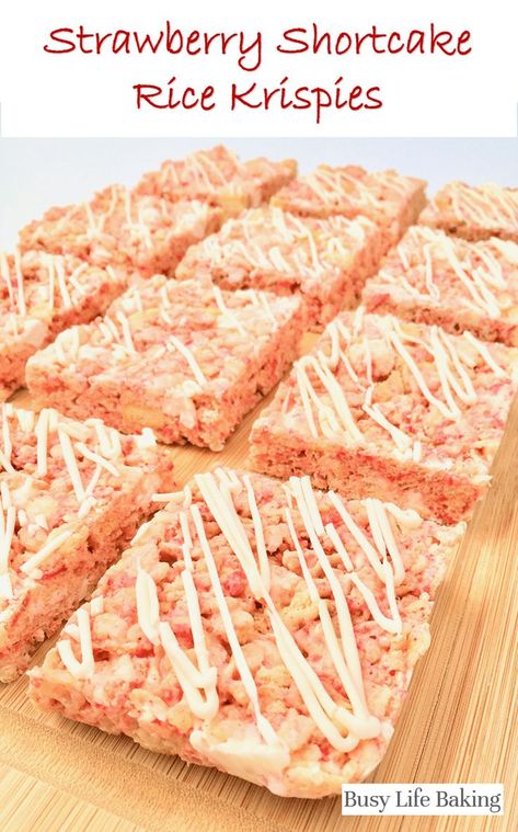 Side view of Strawberry Shortcake Rice Krispies treats on a wooden cutting board Strawberry Shortcake Rice Crispy Treats, Strawberry Crunch Rice Krispies, Rice Krispie Flavors, Strawberry Shortcake Rice Krispie Treats, Flavored Rice Krispie Treats, Strawberry Rice Crispy Treats, Oreo Rice Crispy Treats, Strawberry Rice Krispie Treats, Mm Cake