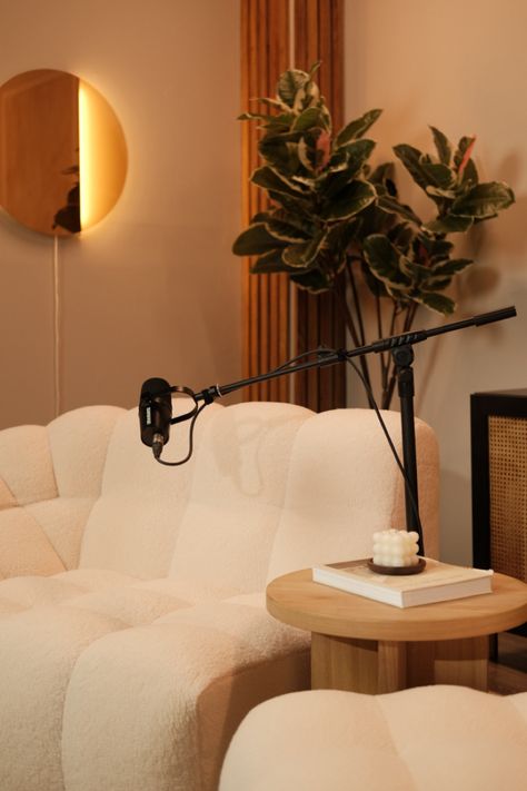 Bouclé couch and podcast setup Earthy Podcast Setup, Podcast Success Aesthetic, Filming Studio Aesthetic, Podcasts Set Ideas, Photoshoot Studio Interior, Podcast Studio Decorating Ideas, Podcast At Home Set Up, Podcast Room Setup Ideas, Podcast Room Decor