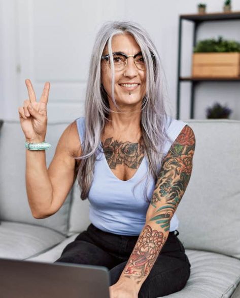 Tattoos On Elderly People, American Traditional Tattoos Aged, Chest Tattoo Older Woman, Old Tattooed Woman, Women With Chest Tattoos, Older Women Tatoos, Tatted Mom Style, One Sleeve Tattoo Women, 50 Year Old Women With Tattoos