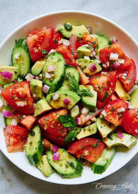 Delicious and addictive, this Tomato, Cucumber and Avocado Salad will make you prepare it again and again. Make it a few hours before serving - it will only get better. | cravingtasty.com Tomato Cucumber Avocado Salad, Cucumber And Avocado Salad, Craving Tasty, Tomato And Cucumber Salad, Cucumber Tomato Avocado Salad, Tomato And Cucumber, Cucumber Avocado Salad, Delicious Salad Dressings, Avocado Salad Recipes